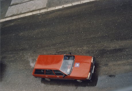 red car blue flag